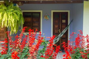 Um jardim em Pousada Aconchego