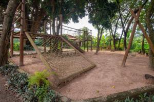 Um jardim em Pousada Aconchego