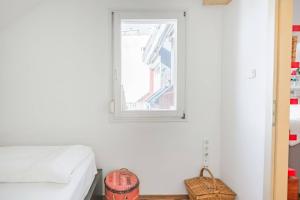 A bed or beds in a room at Relax Into Loft Living At A Light-Filled City Escape