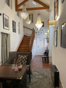 a living room with a couch and a table at Sintra1012 Boutique Guesthouse in Sintra