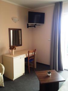טלויזיה ו/או מרכז בידור ב-VILLA VOLOSKO with private parking and breakfast,seaview