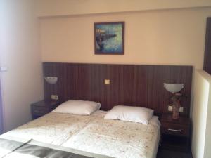 מיטה או מיטות בחדר ב-VILLA VOLOSKO with private parking and breakfast,seaview