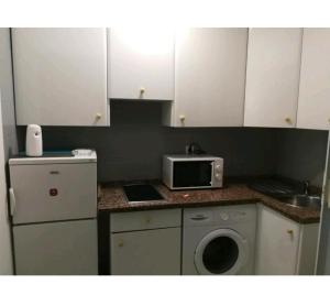 Kuchyňa alebo kuchynka v ubytovaní Apartamentos centro histórico