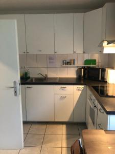 Kuchyň nebo kuchyňský kout v ubytování Ferienhaus Cassel