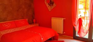 Postel nebo postele na pokoji v ubytování B&B LAVIKA PEDARA