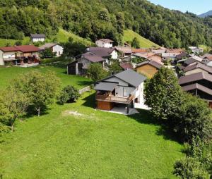 an aerial view of a small village with houses at Hisa Smast in Kobarid