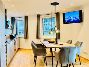 Televízia a/alebo spoločenská miestnosť v ubytovaní Royal Swan Appartement, Tirol