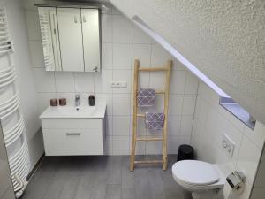 Ванна кімната в Ferienwohnung Verecunda