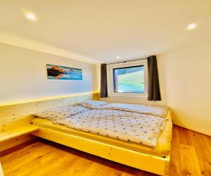 Posteľ alebo postele v izbe v ubytovaní Royal Swan Appartement, Tirol