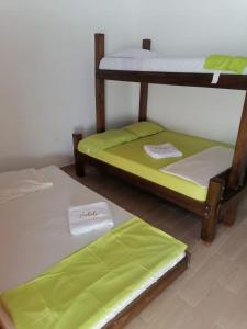 Postel nebo postele na pokoji v ubytování ZABDI COVEÑAS