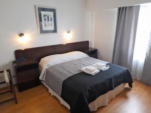 Postel nebo postele na pokoji v ubytování Rosa de los Viajes