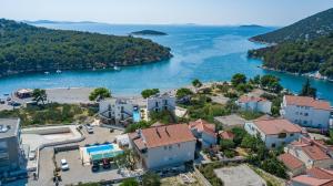 an aerial view of a small town on the water at Wonderhouse SOVLJA in Tribunj