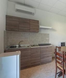 Kuchyň nebo kuchyňský kout v ubytování Albergo Luisss