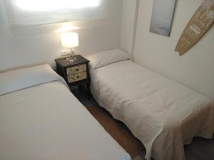 Postel nebo postele na pokoji v ubytování Casamar