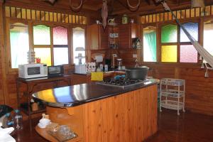 Kuchyň nebo kuchyňský kout v ubytování Finca Chalet La Tawa