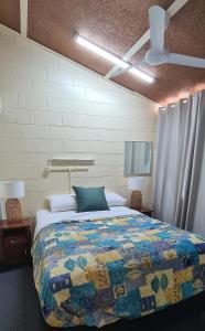 Cama o camas de una habitación en Emthree Seaside Apartments