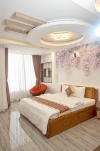 Una cama o camas en una habitación de Phương Linh Hotel