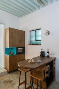 Virtuvė arba virtuvėlė apgyvendinimo įstaigoje Daya - Old City Acre