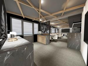 a large office with tables and chairs in a room at Alpenhotel Steirerhof in Tauplitzalm