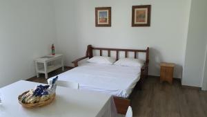 Ένα ή περισσότερα κρεβάτια σε δωμάτιο στο Villa Leone