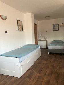 Rúm í herbergi á Apartmán Staňkov