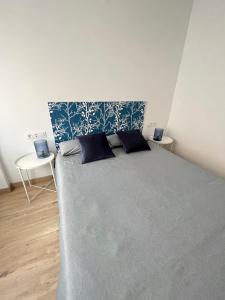 Postel nebo postele na pokoji v ubytování MGG - Apartamento Muelle