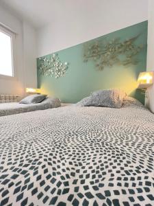 Postel nebo postele na pokoji v ubytování MGG - Apartamento Muelle