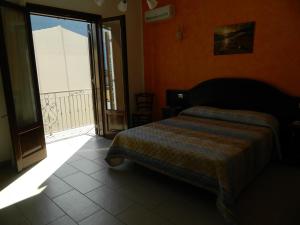 Posteľ alebo postele v izbe v ubytovaní Baia Santa Margherita B&B