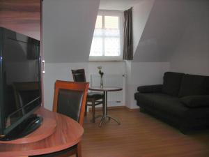 TV a/nebo společenská místnost v ubytování Hotel Landgasthof Euringer
