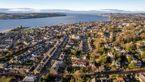 an aerial view of a city next to the water at Casa Fresa - Orchar Suites in Dundee