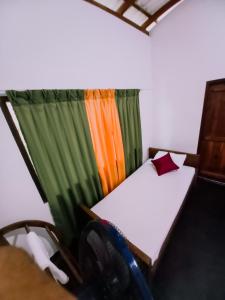 Letto o letti in una camera di Rainforest River Bay