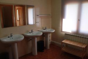 Koupelna v ubytování Albergue Los Chorros + 25 fotografií