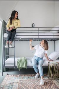 Letto o letti in una camera di Pink Flamingo Boutique Hostel