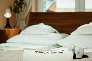 Łóżko lub łóżka w pokoju w obiekcie Apartament Giencyno Koncina Zakopane