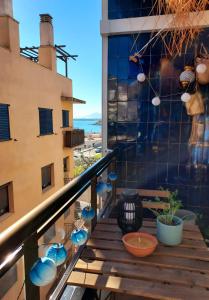 a balcony with a view of the ocean at Apartament Ampolla Port in L'Ampolla