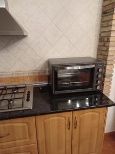 Kuchyňa alebo kuchynka v ubytovaní El Almendro de Fuentes Nuevas