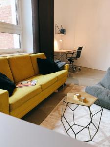 Ein Sitzbereich in der Unterkunft GOHO Loft