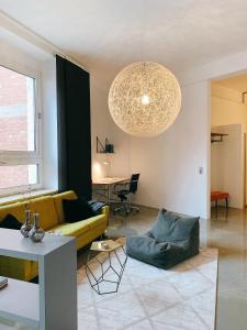 Ein Sitzbereich in der Unterkunft GOHO Loft