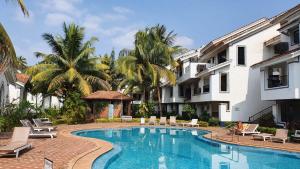 Bazén v ubytování Casa Legend Villa & Apartments Arpora - Baga - Goa nebo v jeho okolí