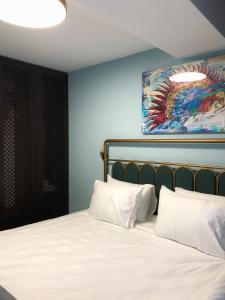 Letto o letti in una camera di Paliani Hotel