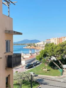 a view from a building with a view of the water at Apartament Ampolla Port in L'Ampolla
