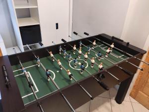 a group of men playing soccer on a table at Western Tatras Slovakia in Oravský Biely Potok