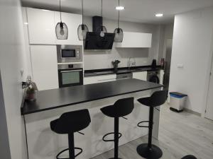 A kitchen or kitchenette at El Rincón de Moreno
