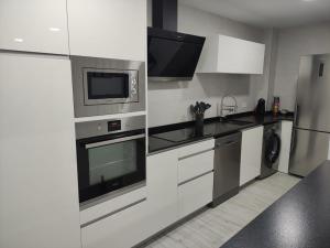 A kitchen or kitchenette at El Rincón de Moreno
