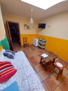 TV a/nebo společenská místnost v ubytování Casa Rural El Callejo