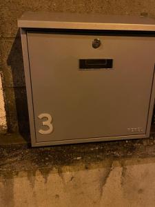 a metal box sitting on the side of a street at Room of Tournai 2 in Tournai