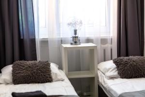 Posteľ alebo postele v izbe v ubytovaní Apartament Anna
