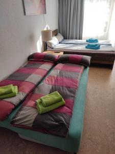 Postel nebo postele na pokoji v ubytování Ferienapartment "Alois" in Sankt Englmar + 17 fotografií