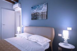 Posteľ alebo postele v izbe v ubytovaní HAMMAM Venice
