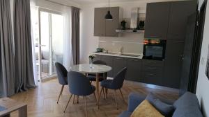 Kuchyň nebo kuchyňský kout v ubytování Apartman Bella 2